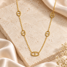 Aurelia Link Necklace styled on stone